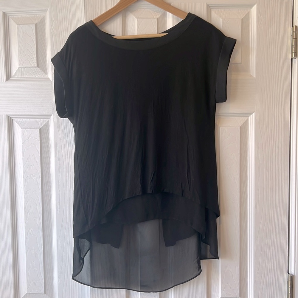 Black blouse with open see-through back